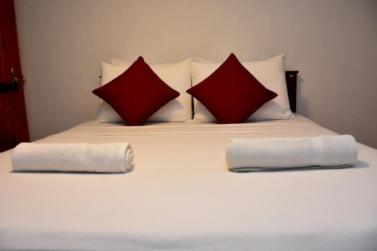 Rainforest Holiday Inn دينيايا المظهر الخارجي الصورة