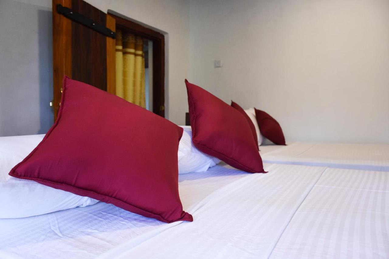 Rainforest Holiday Inn دينيايا المظهر الخارجي الصورة
